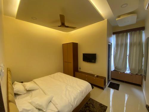 R J Residency