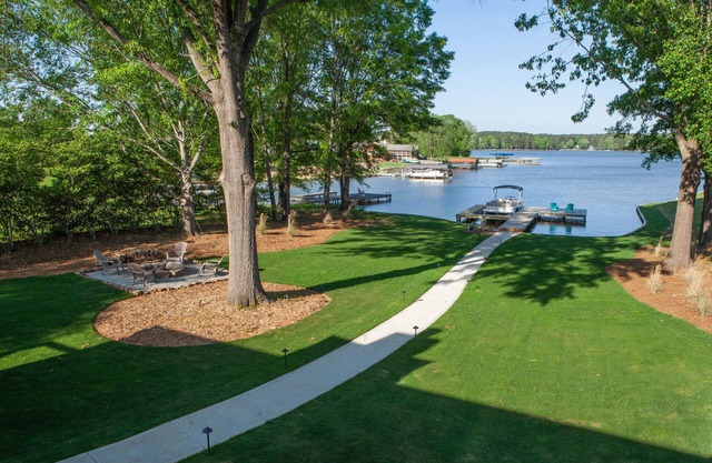 RARE FIND – Beautifully decorated 4B/4.5B Lakefront Getaway! Centrally located