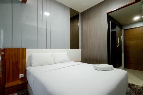 Relaxing Studio at Vida View Makassar Apartment By Travelio