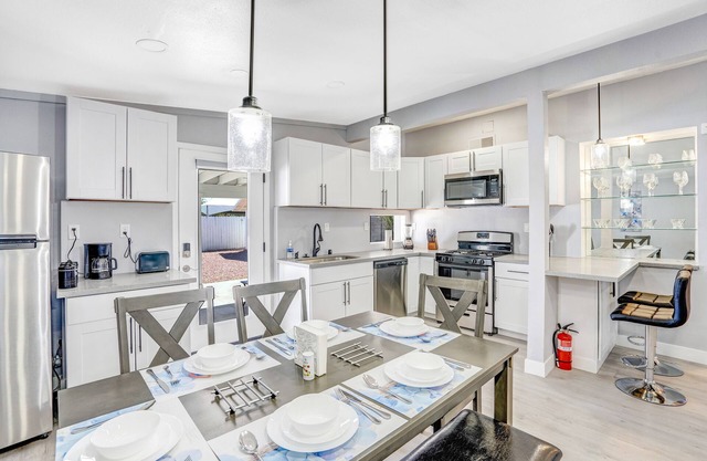 Remodeled Home with Lush Landscapes, King Beds, BBQ, Games, Workspace and More!