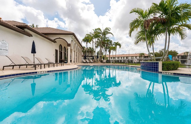 Remodeled Townhome with Pool & Lake Views in Gated Community