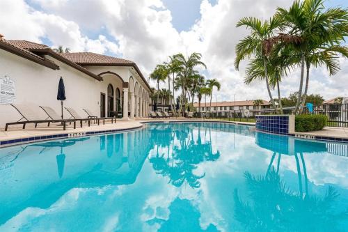 Remodeled Townhome with Pool & Lake Views in Gated
