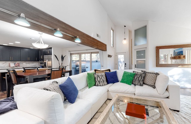 Renovated 2nd-floor condo with deck, grill, fireplace, W/D, & free WiFi