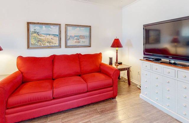 Resort-style condo with indoor/outdoor pools, fishing dock, & private balcony