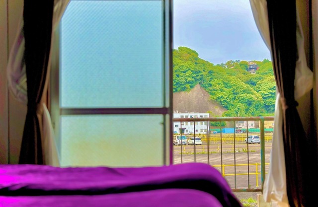 Retro Romantic Room! Private rooftop room with a view of Tokyo Bay beyond the Uraga Dock.