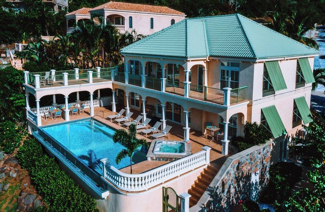 Revel in Timeless Luxury at this RARE Beachfront 4-Bedroom Villa on St. John