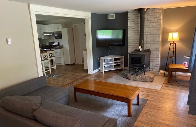 River front 4 season cottage with 2.5 acre serenity with mature trees around