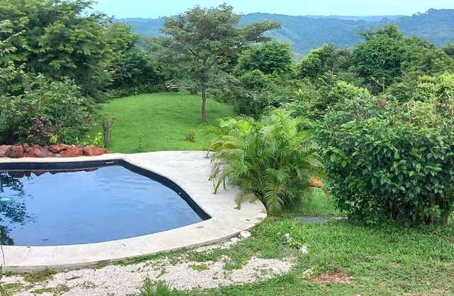 Romantic ocean view cottage with pool - private and secluded
