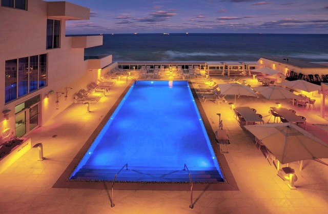 Roomy Oceanfront Stay with Scenic Balcony Views Close to Shopping Centers