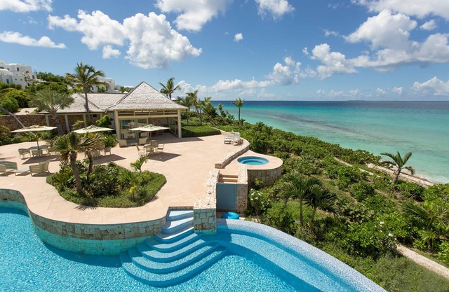 Santosha Estate in Long Bay by Personal Villas - Winding Oceanfront Pool