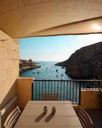 Seafront duplex Penthouse with Terrace overlooking Xlendi Bay