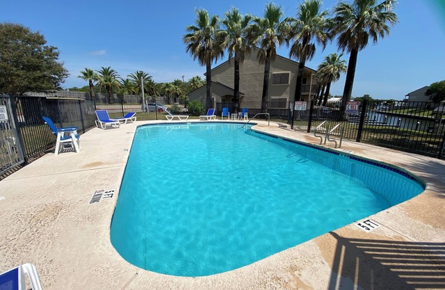 Seaside Escape - Boat Slip and Water View Canal Side Bayhouse Condo!