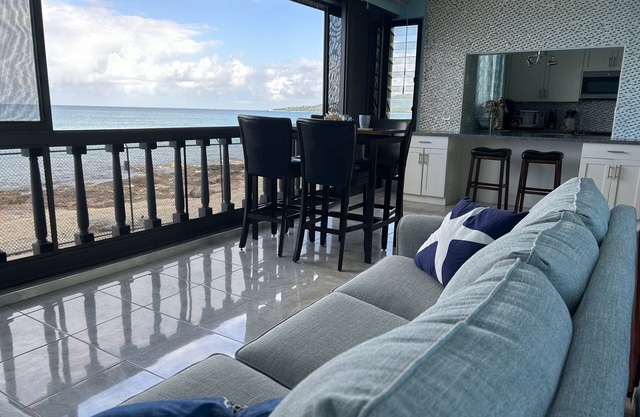 Serenity by the Sea, ocean front condo with beautiful sunsets
