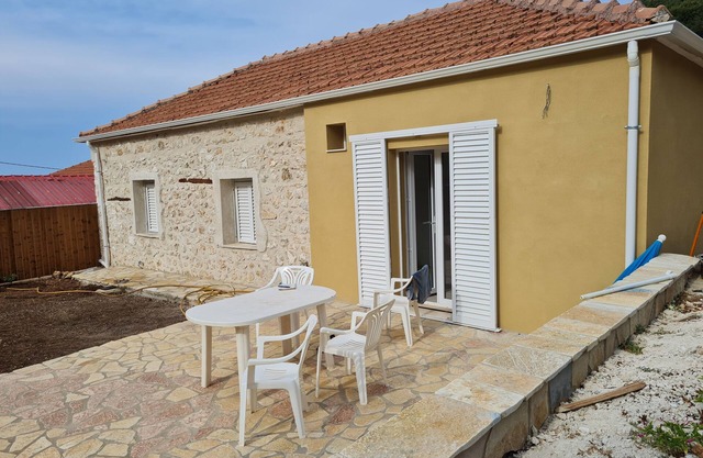 Single-storey house in typical Greek village