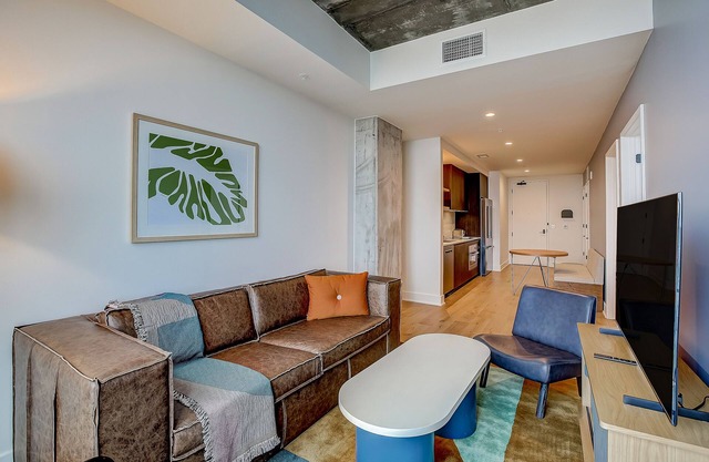 Sleek 15th-Floor Condo with Rooftop Pool, WiFi, Central AC, and Great Location
