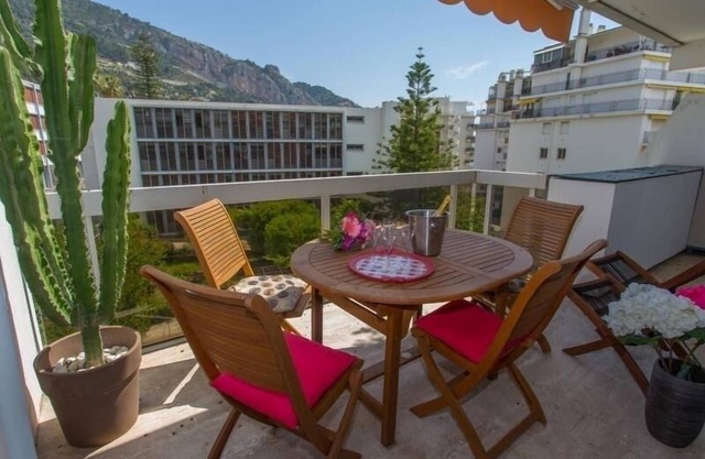 Spacious 1-Bedroom with Pool, Private Parking, and Terrace near Beaches