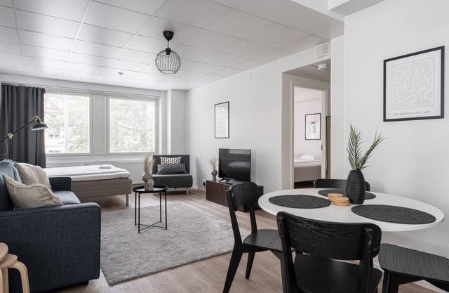 Spacious 1BR Apartment with Balcony in Downtown