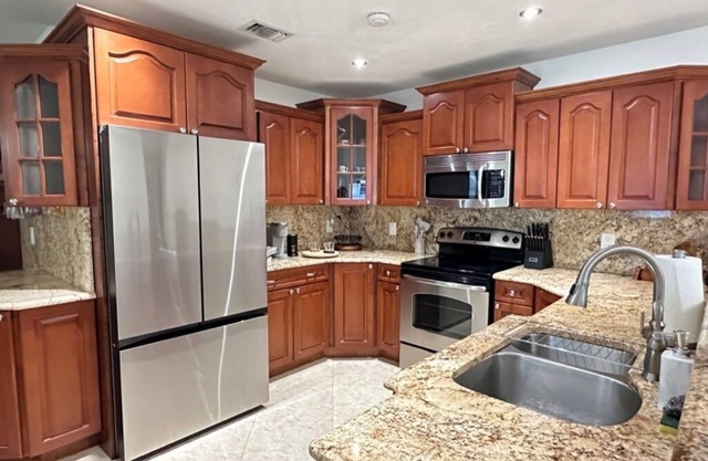 Spacious 2 bedroom home with Private Pool, Game Room, and Water Slide