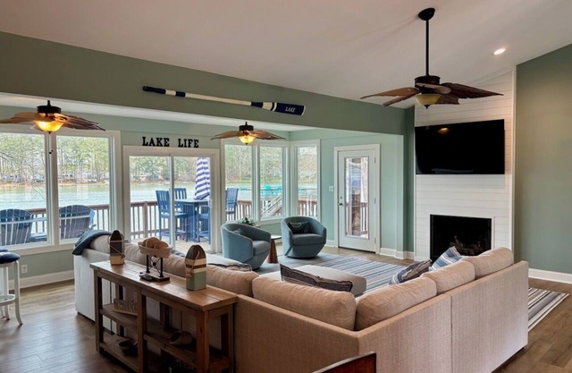 Spacious 7-bedroom, 5-bath home on 168' of a wide, deep-water cove.