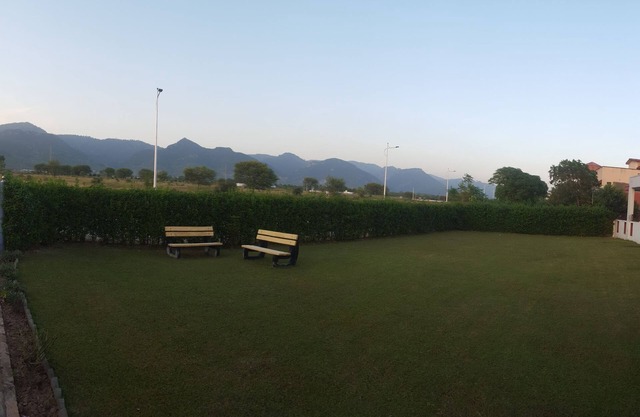 Spacious 9-bedroom villa with WiFi, AC in charming Islamabadnone meting hall.