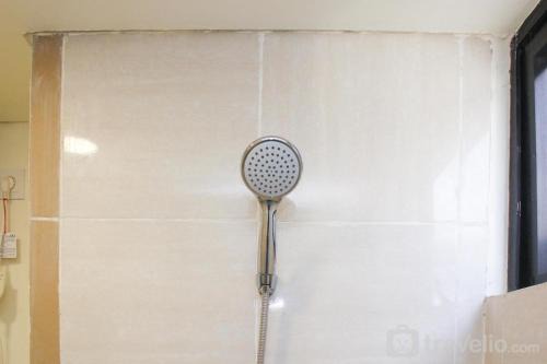 Spacious and Well Appointed 2BR at Meikarta Apartment By Travelio