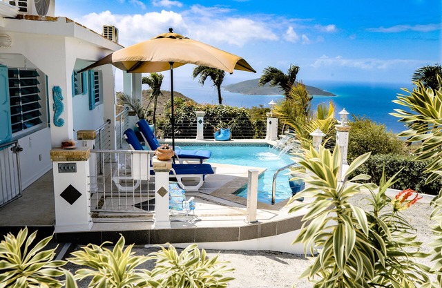 Spacious Hillside Villa w/heated pool, wrap around balcony, vast ocean views