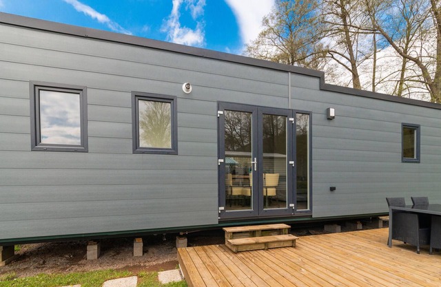 Spacious mobile home with terrace, near a brook