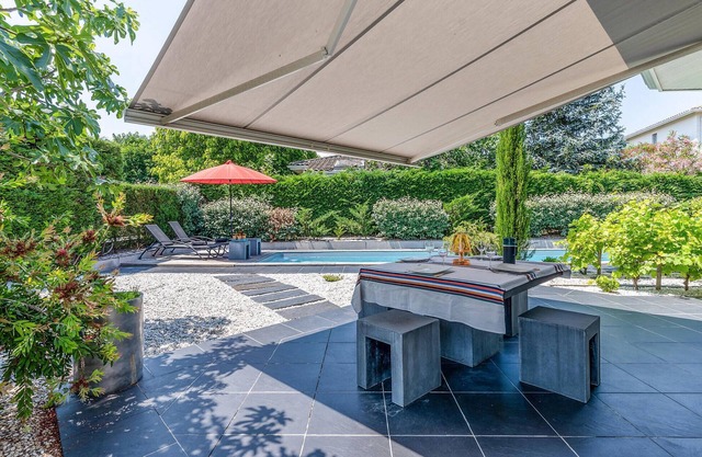 Spacious vacation home with private outdoor pool and beautiful garden area.