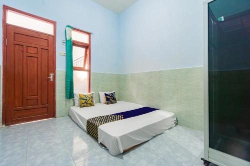 SPOT ON 93965 Ibrahim Guest House Syariah