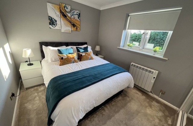 Spotless Two-Bedroom Home with Garden and Parking