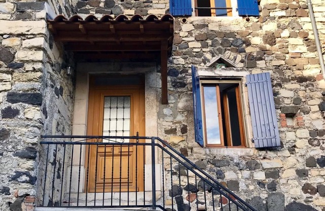 Stone house in the heart of a village Ardéchois