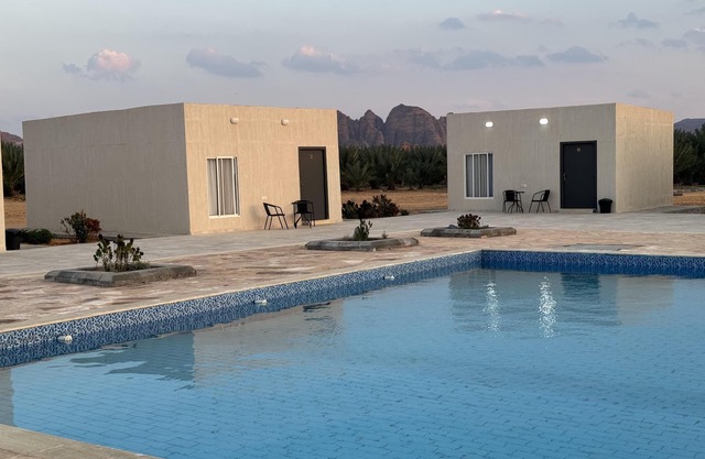 Studio overlooking pool amid flowering and quiet