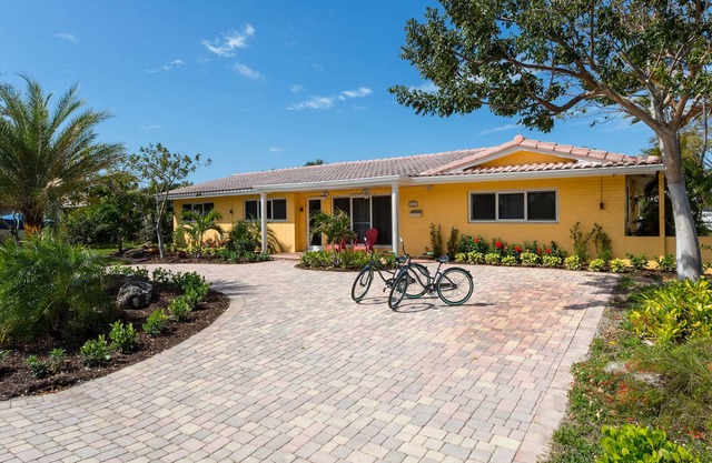 Stunning 5Bedroom Home on Huge Lot with Heated Pool Near Beach
