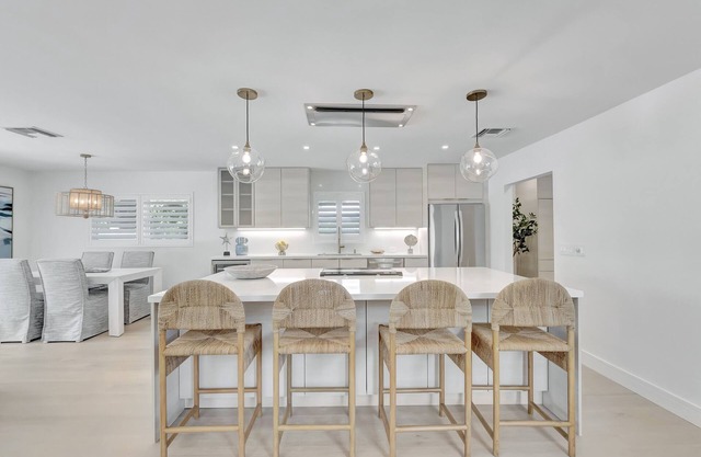 STUNNING COASTAL MODERN 3 BED POOL HOME MINUTES TO THE BEACH AND ATLANTIC AVE.
