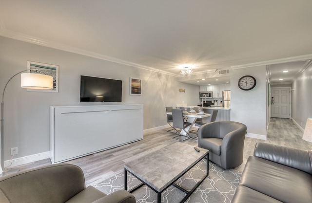 Stunning Modern beach front unit - completely renovated! Includes golf cart!
