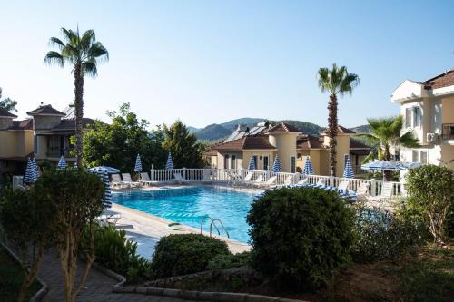Stylish 2BR Apartment in Ölüdeniz by the Forest with Pool