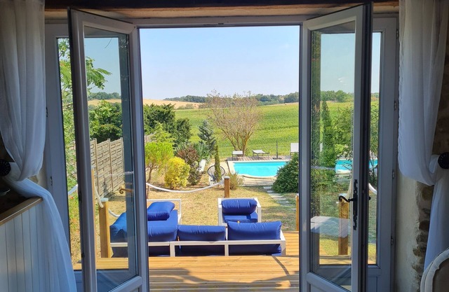 Substantial house with heated pool & stunning views in a picturesque village.