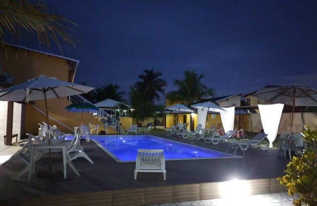 Suite with simple decor, balcony, hammock, air conditioning, minibar and smart TV