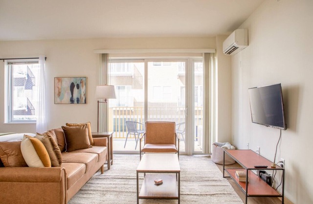Sunlit Modern Apartment with Balcony