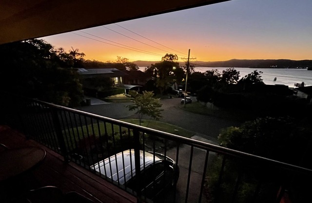 Sunset getaway with panoramic water & mountain view