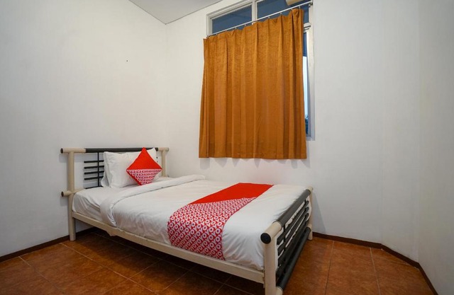 Super OYO 1844 Bravo Residence