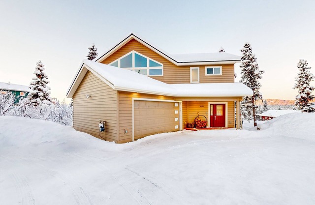 Sweeping mountain and ski view escape near the city center with a hot tub