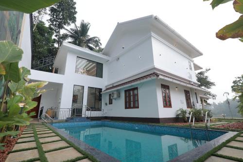 Tatvaura Resort Wayanad