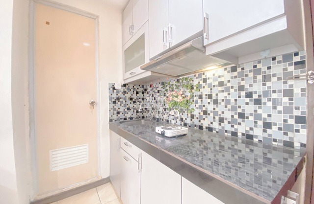 The Cozy Abode 2BR Apartment at Tamansari Panoramic