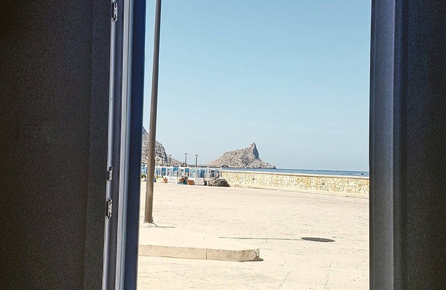 The house a stone's throw from the sea