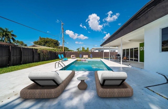 The modern villa with heated pool.
