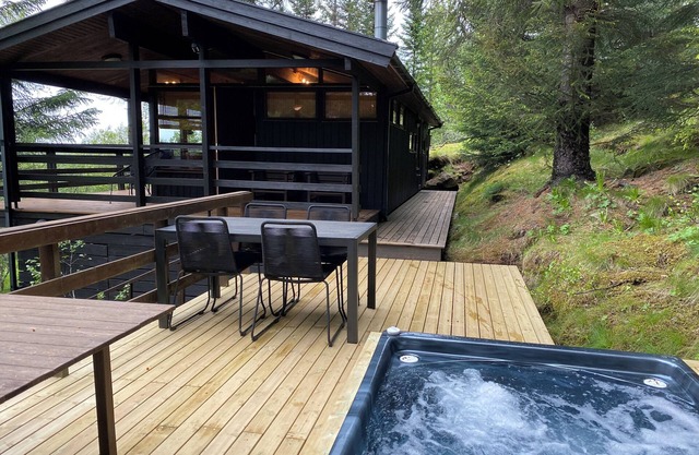 The Secret Cabin with hot tube in nature reserve close to Reykjavik
