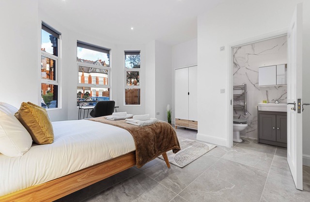 This is a large 4 bed, 2.5 bath garden apartment in a buzzing neighborhood!