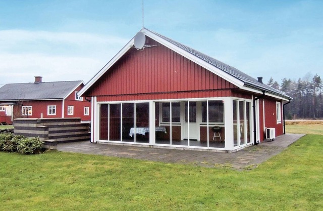 This modern vacation home offers a high standard and is situated on a large, almost park-like plot i