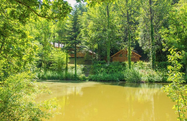 Timber lodge set by the lake with one double and one twin.